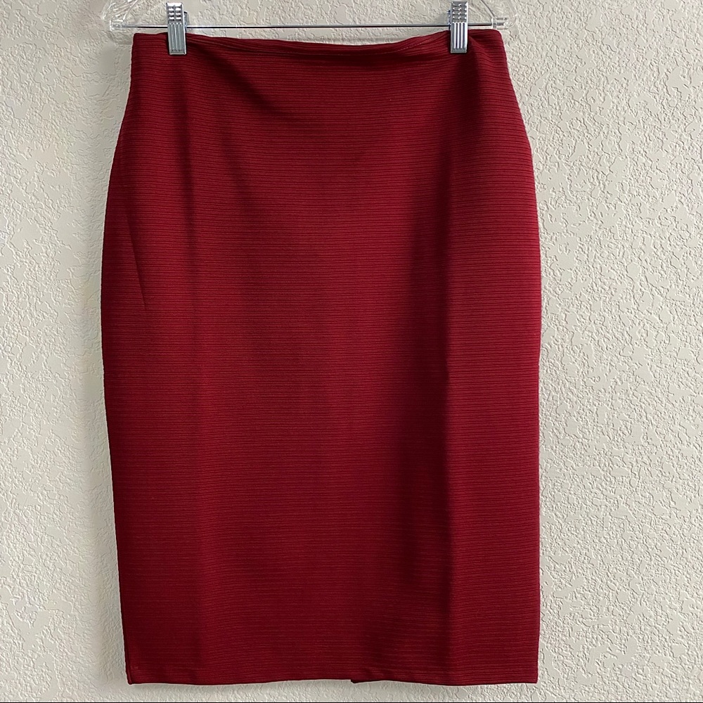 H&M Wine colored skirt with zipper back and slit.